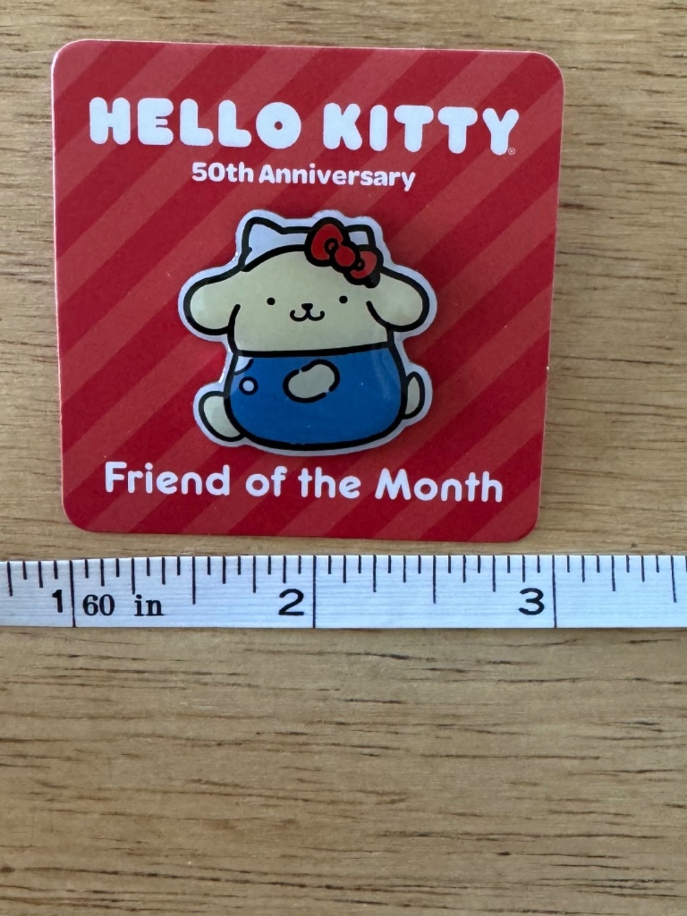 Hello Kitty 50th Anniversary Friend of the Month Pin Pompompurin